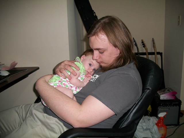 Cuddles with Daddy 2